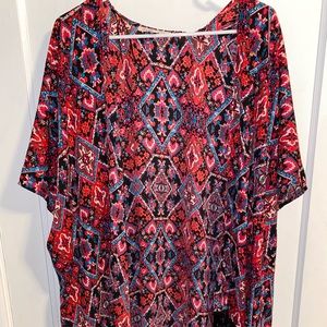 Pink kimono with black fringe